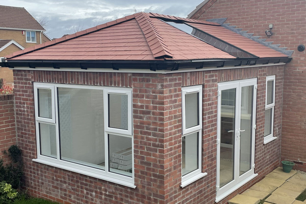 Equinox tiled roof system with modern glass roof panels from Bosomworth Glass in Filey